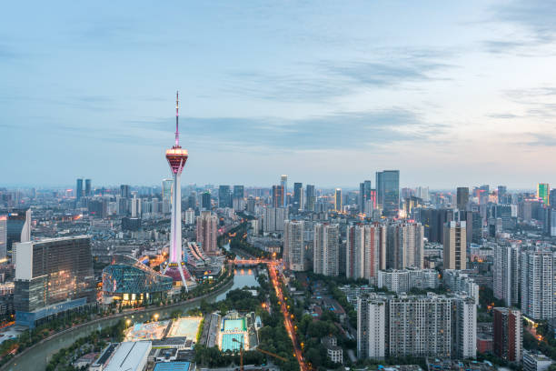Chengdu skyline aerial view with Sichuan TV tower at dusk Chengdu, China - July 20, 2016 : Skyline aerial view with Sichuan TV tower at dusk chengdu photos stock pictures, royalty-free photos & images