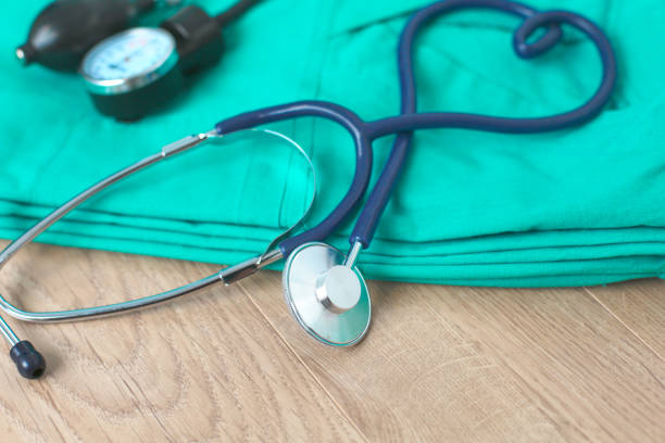istock Medical devices stethoscope, tonometer on medical uniform 904780196