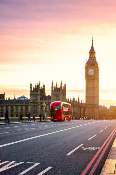 the big ben, house of parliament and double-decker bus blurred in motion, london, uk - big ben london england uk double decker bus imagens e fotografias de stock