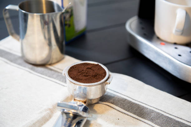 istock coffee powder pressed ready to place in coffee machine 904790820