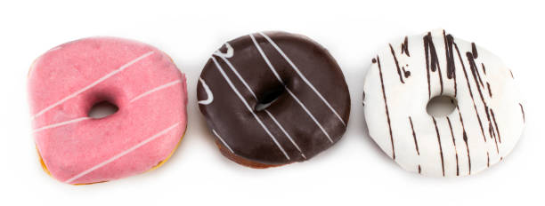 istock Delicious colorful donuts isolated on white background 904801070