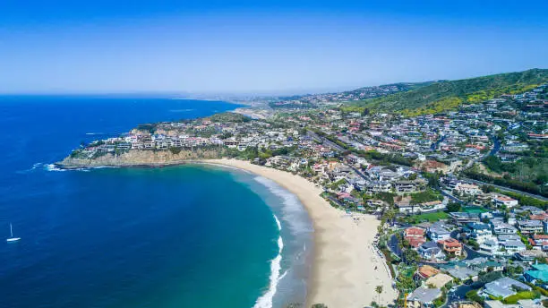 View of Crescent Bay in Laguna Beach, Orange County, Southern California overlooking Emerald Bay.  OC received exceptional rain in 2017 which caused the foliage to be extra lush - much more than usual.
