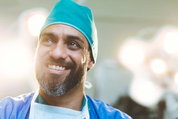 istock Thoughtful smiling doctor in hospital 904802086