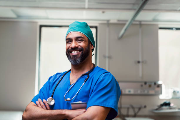 istock Portrait of smiling practitioner with arms crossed 904802320