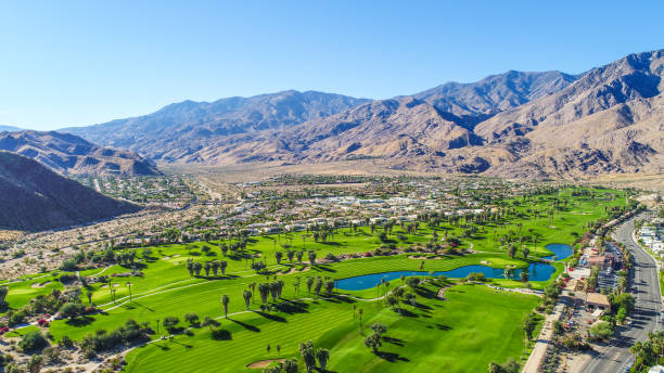 Aerial View of Palm Springs A beautiful aerial of Palm Springs and Palm Desert taking during a gorgeous blue-sky morning with 25+ miles of visibility. coachella valley photos stock pictures, royalty-free photos & images