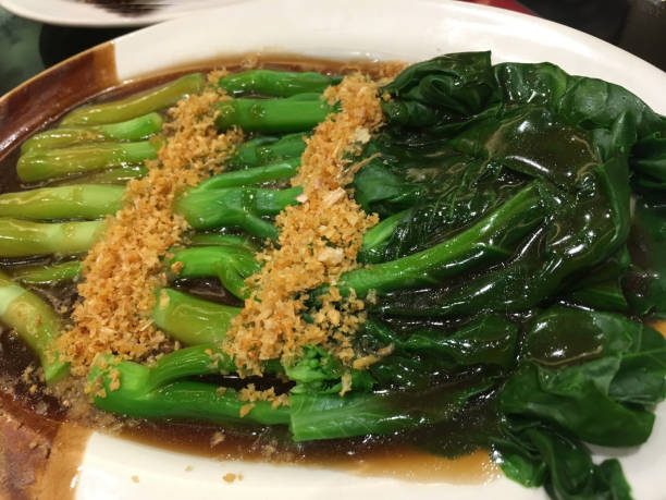istock Fried green vegetables, delicious Chinese food. 904809712