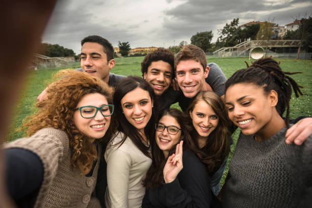istock friends take a selfie at the park 904817516
