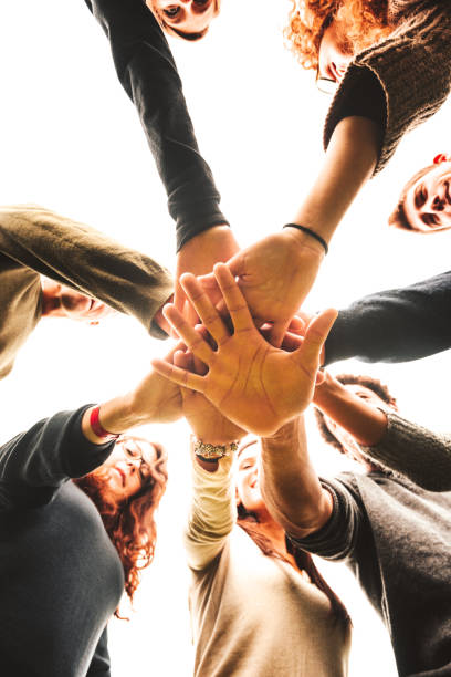 istock stack of hands for the teamwork of friends 904817648