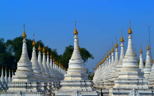 istock Rows of steeples in a temple in Mandalay, Myanmar. 904817686