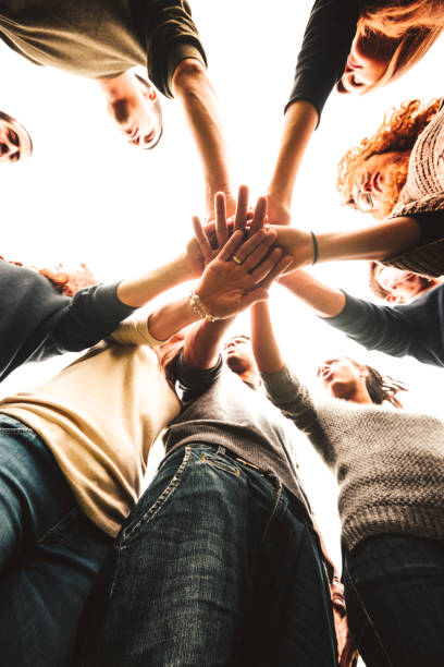 istock stack of hands for the teamwork of friends 904817712