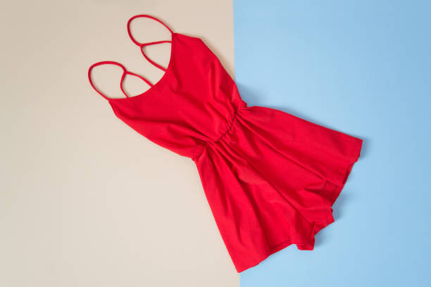 istock Red romper, tender pink and blue background. Fashionable concept 904821056