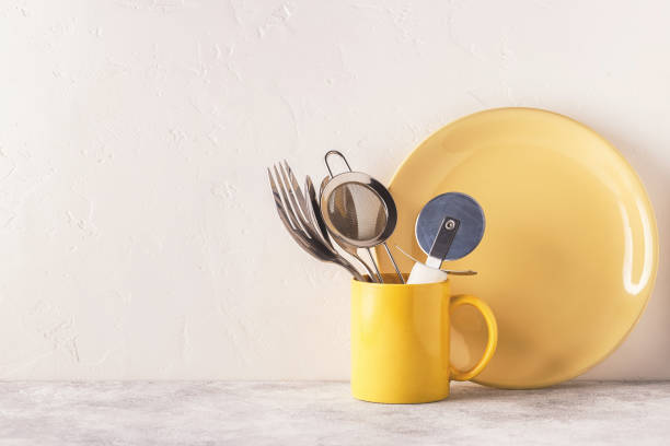 istock Crockery and cutlery on a light table. 904821522