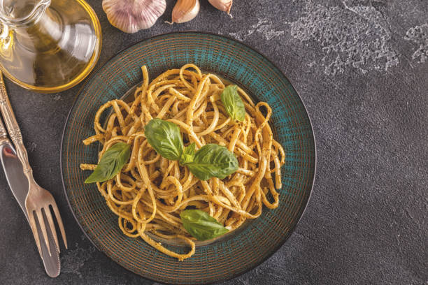 istock Pasta with homemade pesto sauce. 904822174