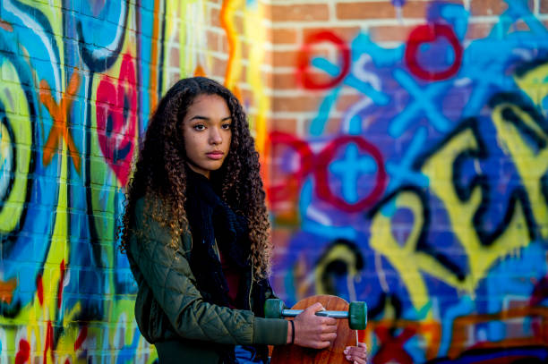 istock Girl With Skateboard 904825874