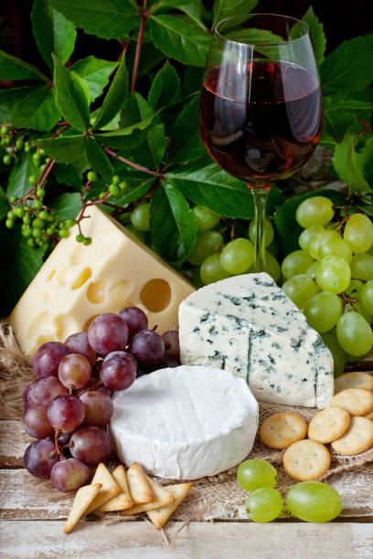 istock Various types of cheese on a wooden  board 904829606