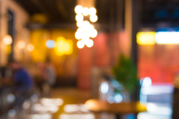 istock Abstract blur background of restaurant pub interior 904834044