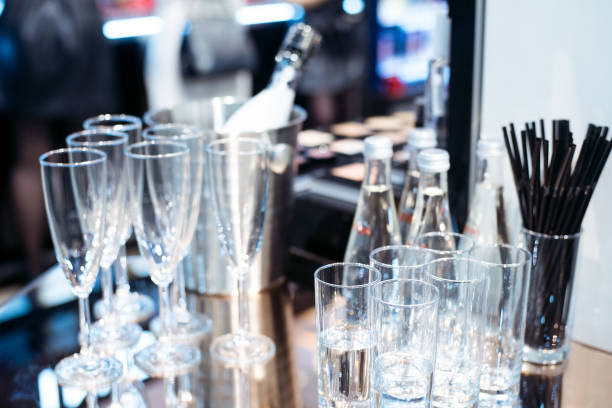 istock Empty glasses on table in night club or restaurant, closeup 904834268