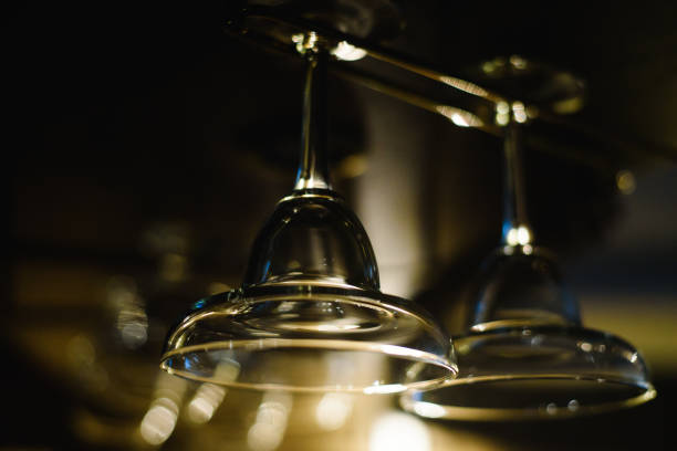 istock Empty glasses on table in night club or restaurant, closeup 904836796