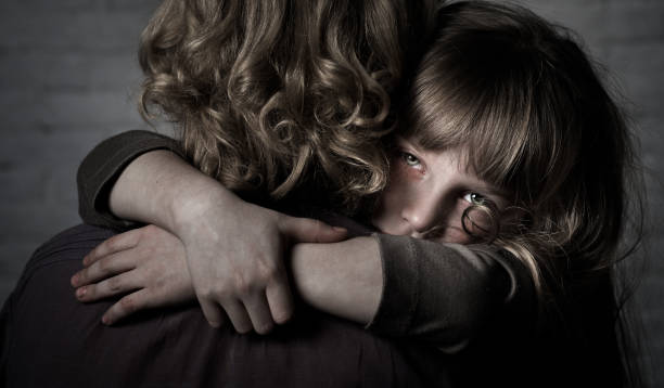 istock Girl hugging mother. 904848382
