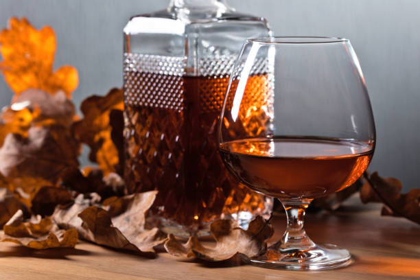 istock Brandy and dried up oak leaves . 904852788