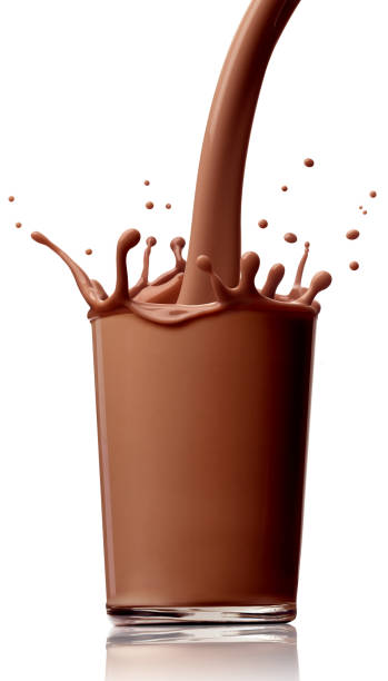 istock chocolate milk drink splash glass straw 904856608