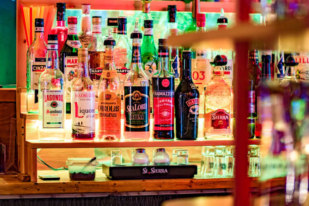 istock Various alcohol bottles lit in the bar 904861216