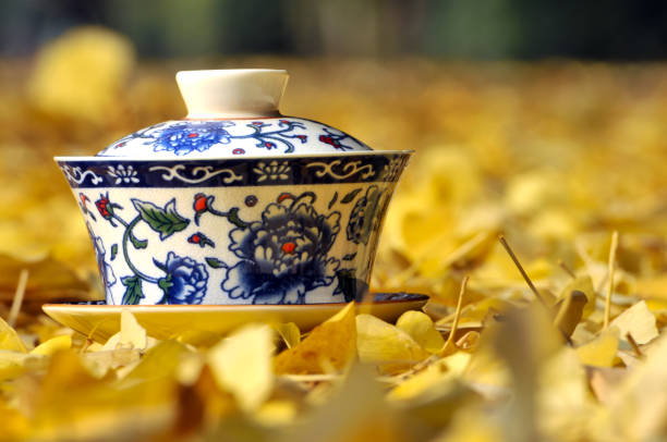 Chinese tea cup on the ginkgo leaf