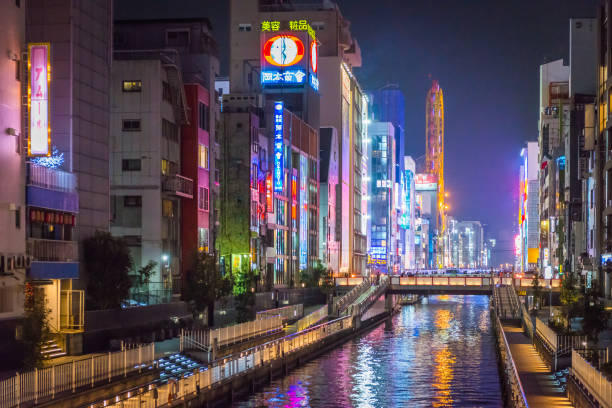 istock Osaka Dotonbori canal illuminated neon billboards night city skyline Japan 904864788