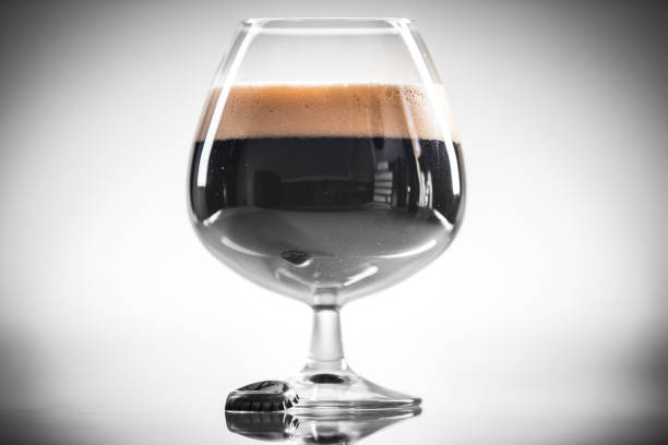 Homebrew Stout Dark or Black Beer over Bright Grey Background