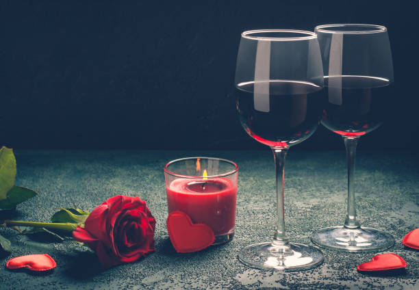 istock Valentines day greeting card concept. Wine glasses, rose and can 904871536