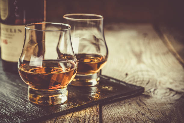 istock Whiskey with ice in glasses 904871924