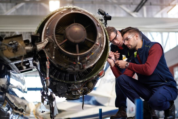 istock Aircraft mechanics in the hangar 904871946