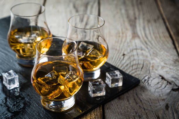 istock Whiskey with ice in glasses 904872094