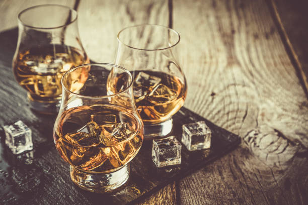 istock Whiskey with ice in glasses 904872126