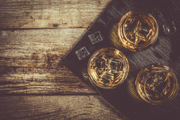istock Whiskey with ice in glasses 904872476