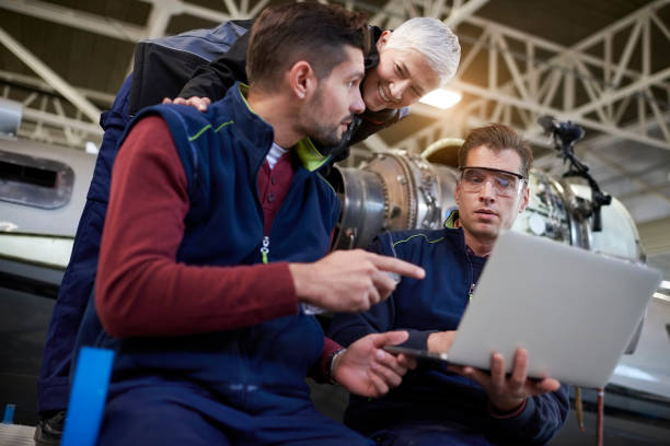 istock Aircraft mechanics in the hangar 904872694