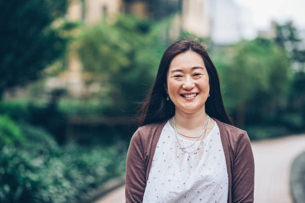 istock Smiling Japanese woman 904872922