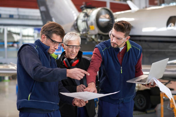 istock Aircraft mechanics in the hangar 904873254
