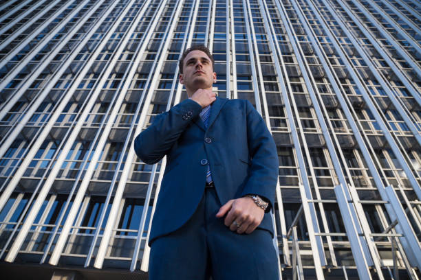 istock Confident businessman on urban background 904876540