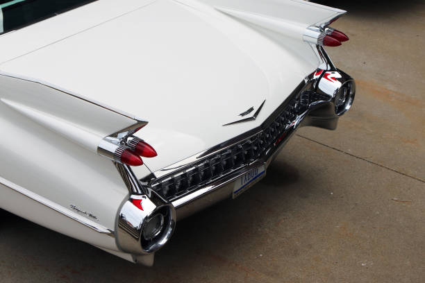 Tail fins on a 1959 Cadillac Sedan de Ville Flint, Michigan-December 30, 2017:  1959 Cadillac Coupe de Ville.  This model represents the high point of American car design and luxury. 1950 1959 photos stock pictures, royalty-free photos & images