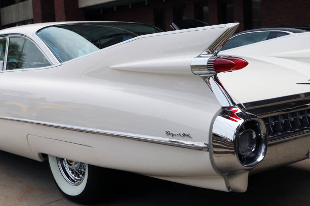 Tail fins on a 1959 Cadillac Sedan de Ville Flint, Michigan-December 30, 2017:  1959 Cadillac Coupe de Ville.  This model represents the high point of American car design and luxury. spoiler stock pictures, royalty-free photos & images