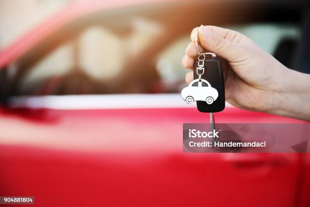 Hand Holding Keys To New Car Stock Photo - Download Image Now - Car, New, Buying