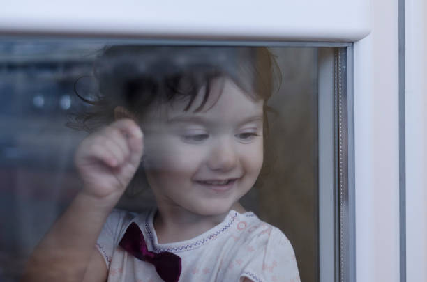 istock Small angel beauty with sparkling light in the eyes 904891540