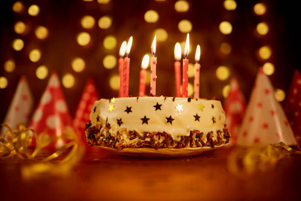 istock Happy birthday cake with candles 904892606