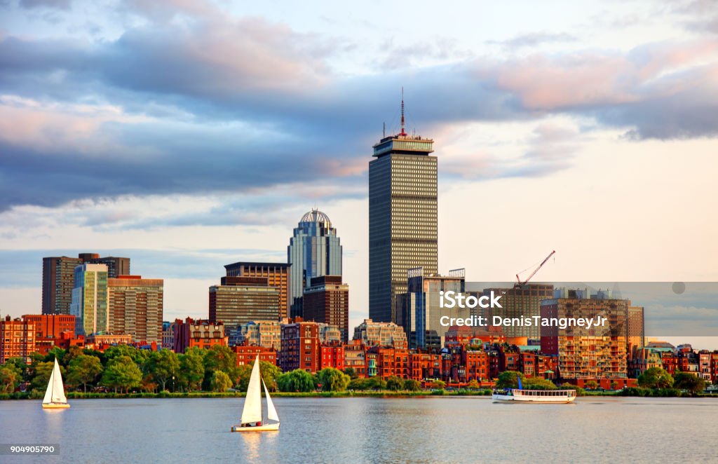 Sailboats on the Charles River in Boston Massachusetts Sailing on the Charles River in Boston, Massachusetts. Boston is known for its central role in American history, world-class educational institutions, cultural facilities, and champion sports franchises Boston - Massachusetts Stock Photo