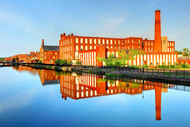 istock Mills reflecting on a canal in Holyoke Massachusetts 904905792