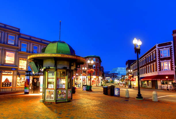 Harvard Square in Cambridge, Massachusetts Harvard Square is a triangular plaza at the intersection of Massachusetts Avenue, Brattle Street, and John F. Kennedy Street, near the center of Cambridge cambridge massachusetts stock pictures, royalty-free photos & images