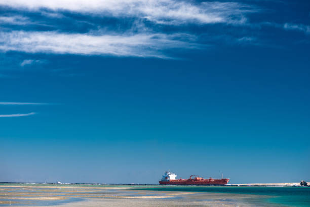 istock Red cargo ship sailing in Red Sea 904908668
