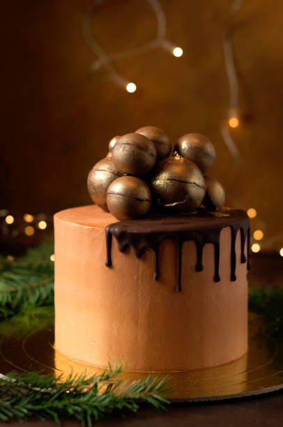 istock festive cake layers chocolate cream golden plate 904915236