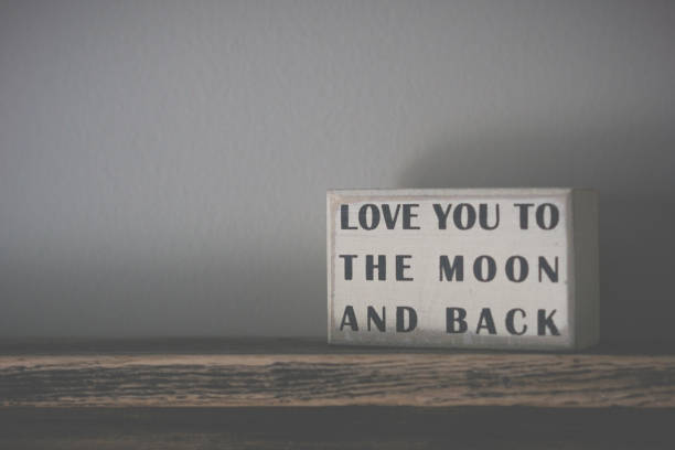 istock Love words sign wood block 904915244